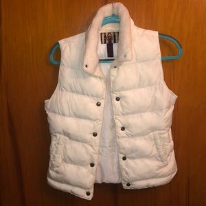White fur vest